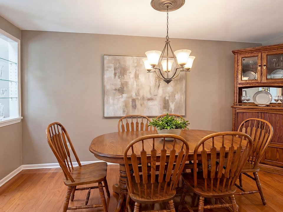 A staged after image of a dining room, styled around the seller's existing furniture